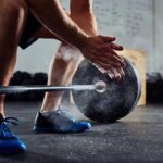 CrossFit gym with rubber flooring and athletes training
