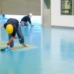 Textured epoxy flooring in a commercial workspace