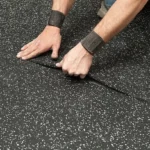 Athletes training on durable rubber gym flooring that provides impact absorption, slip resistance, and long-lasting performance.