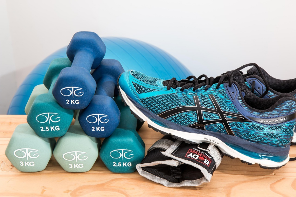 Indoor sports facilities with rubber gym flooring designed to reduce impact and improve athlete safety during games and training.