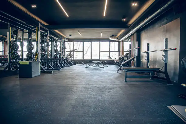 Indoor sports facilities with rubber gym flooring designed to reduce impact and improve athlete safety during games and training.