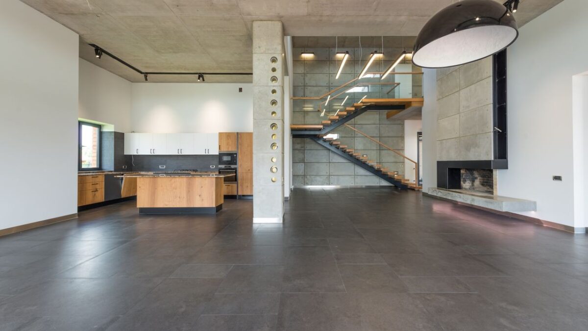 Residential epoxy floor being cleaned and maintained for long-term durability
