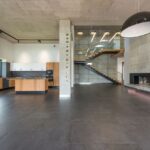 Residential epoxy floor being cleaned and maintained for long-term durability