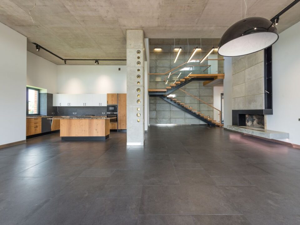 Residential epoxy floor being cleaned and maintained for long-term durability