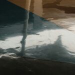 Cracked epoxy floor showing surface damage and coating failure